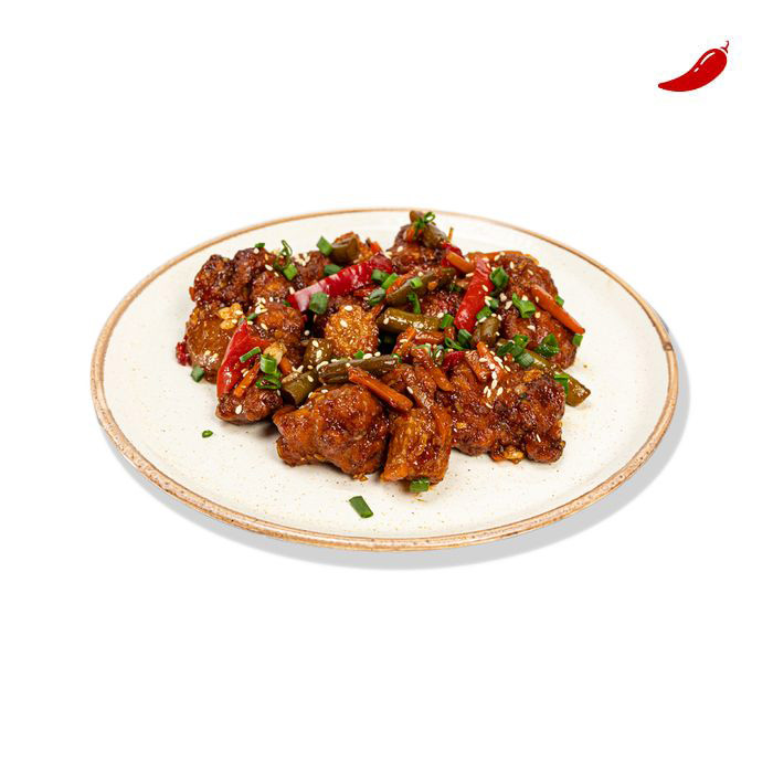 Курячі байтси з овочами WOK